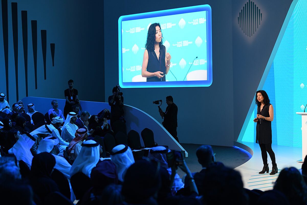 A young entrepreneur women giving a presentation in an event